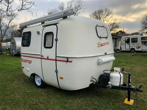 for sale, scamp fiberglass very good condition 13&x27;. . Used scamp trailer for sale